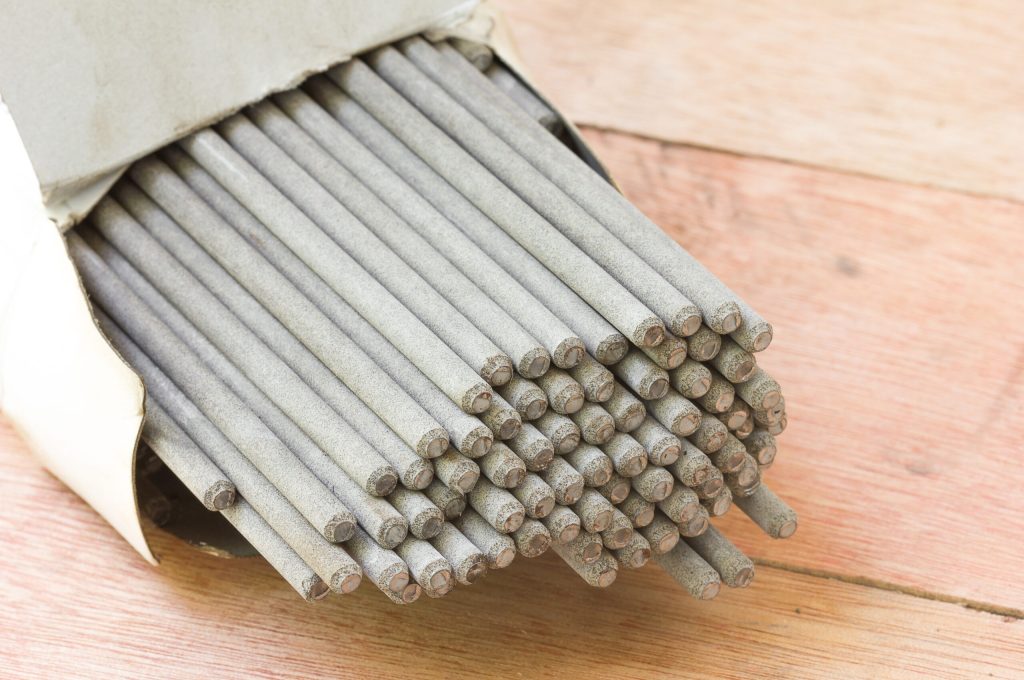 Welding,Electrodes,On,The,Wooden,Floor.